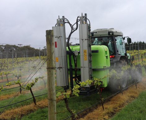 Linkage vineyard sprayer with tangential fans